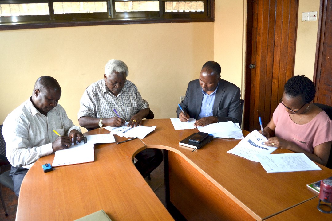Signing a Memorandum of Understanding to implement the Audit Accountability Initiative in Tanzania 